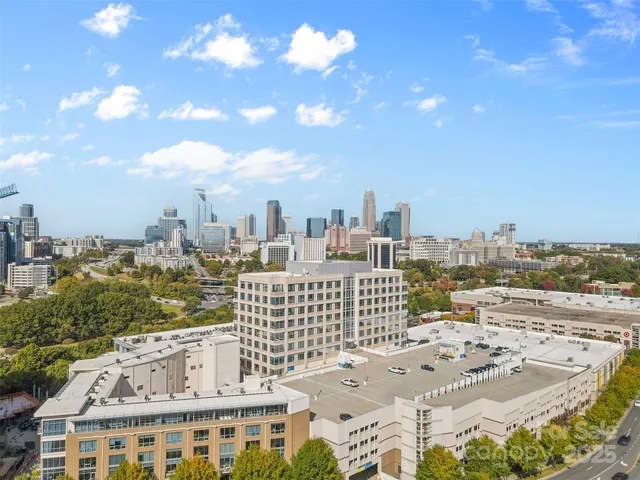a view of a city with tall buildings