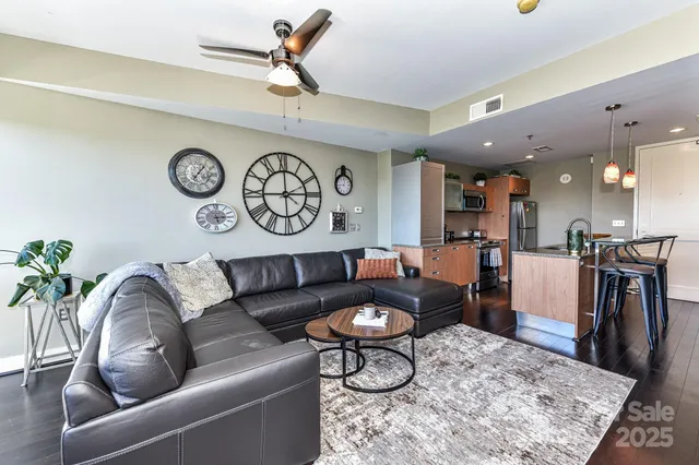 a living room with furniture and a table