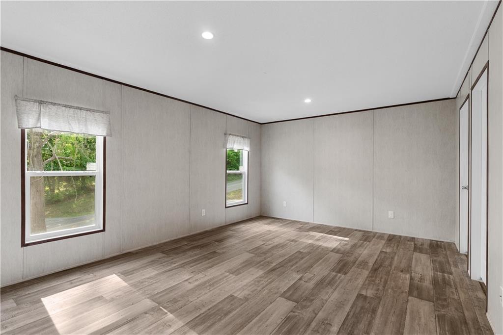 120 James Street Northwest Resaca, GA 30735 - Photo 15 of 31 wooden floor in an empty room with a window