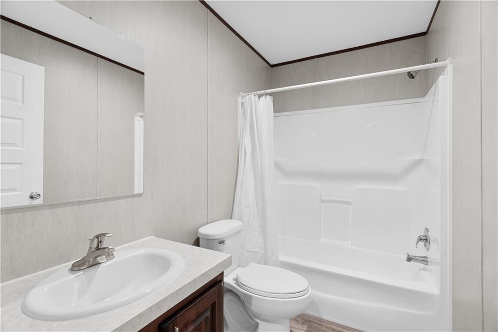 120 James Street Northwest Resaca, GA 30735 - Photo 24 of 31 a bathroom with a sink toilet and shower