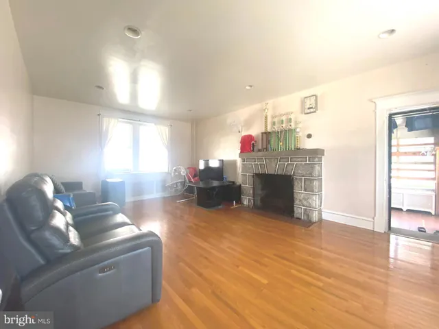 a view of a dining room with furniture and window