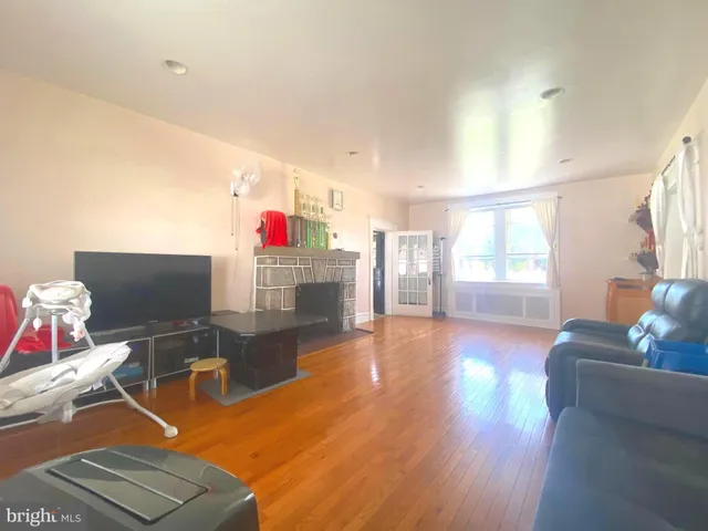 a view of a dining room with furniture and window