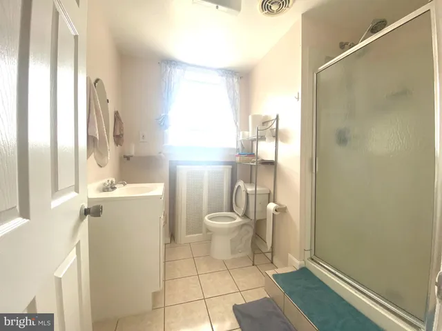 a view of a living room and dining room