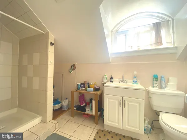 a view of a hallway with stairs