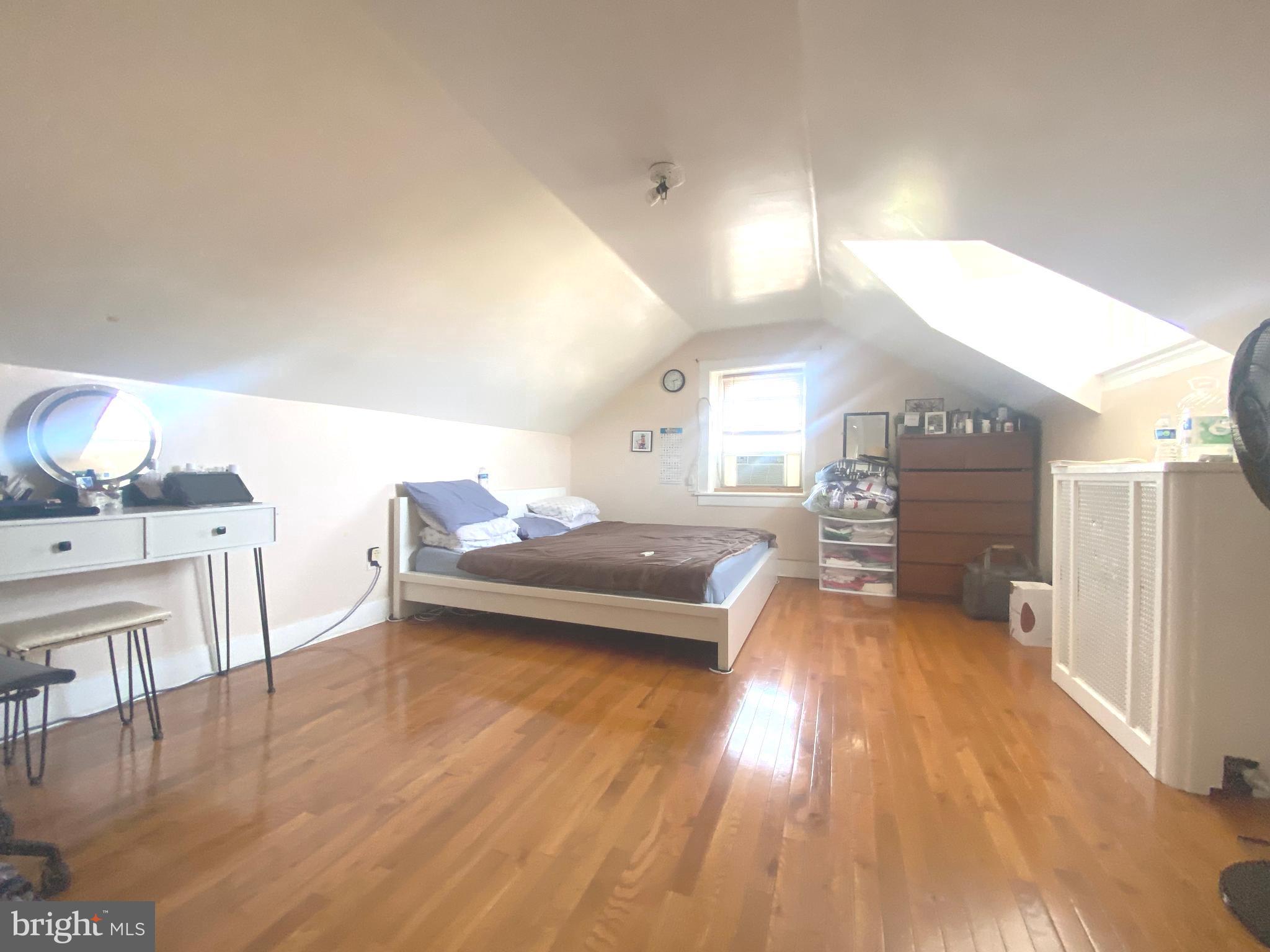2249 Knorr Street Philadelphia, PA 19149 - Photo 34 of 40 a living room with furniture and a wooden floor
