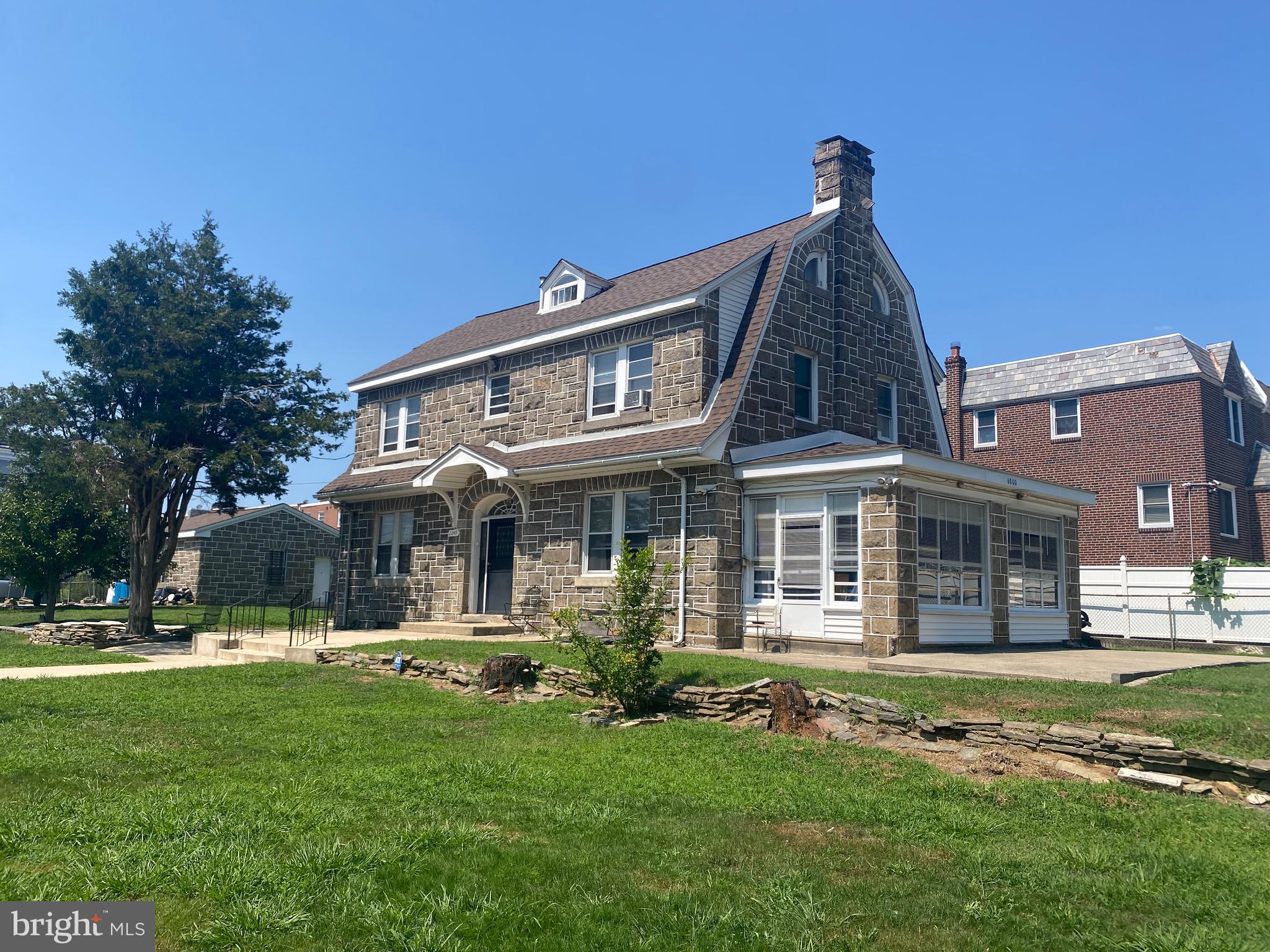 2249 Knorr Street Philadelphia, PA 19149 - Photo 4 of 40 a front view of a house with a yard
