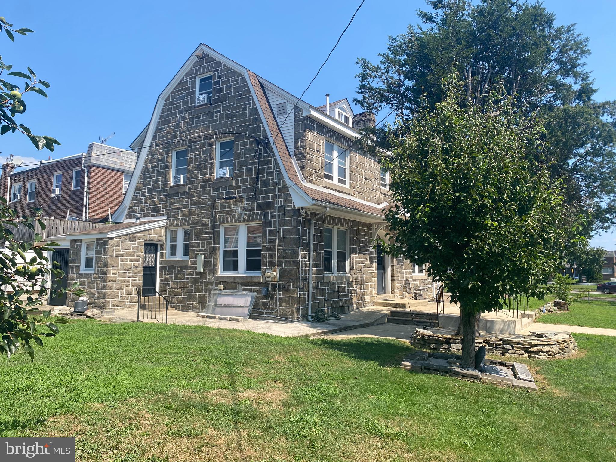2249 Knorr Street Philadelphia, PA 19149 - Photo 8 of 40 a front view of a house with a yard