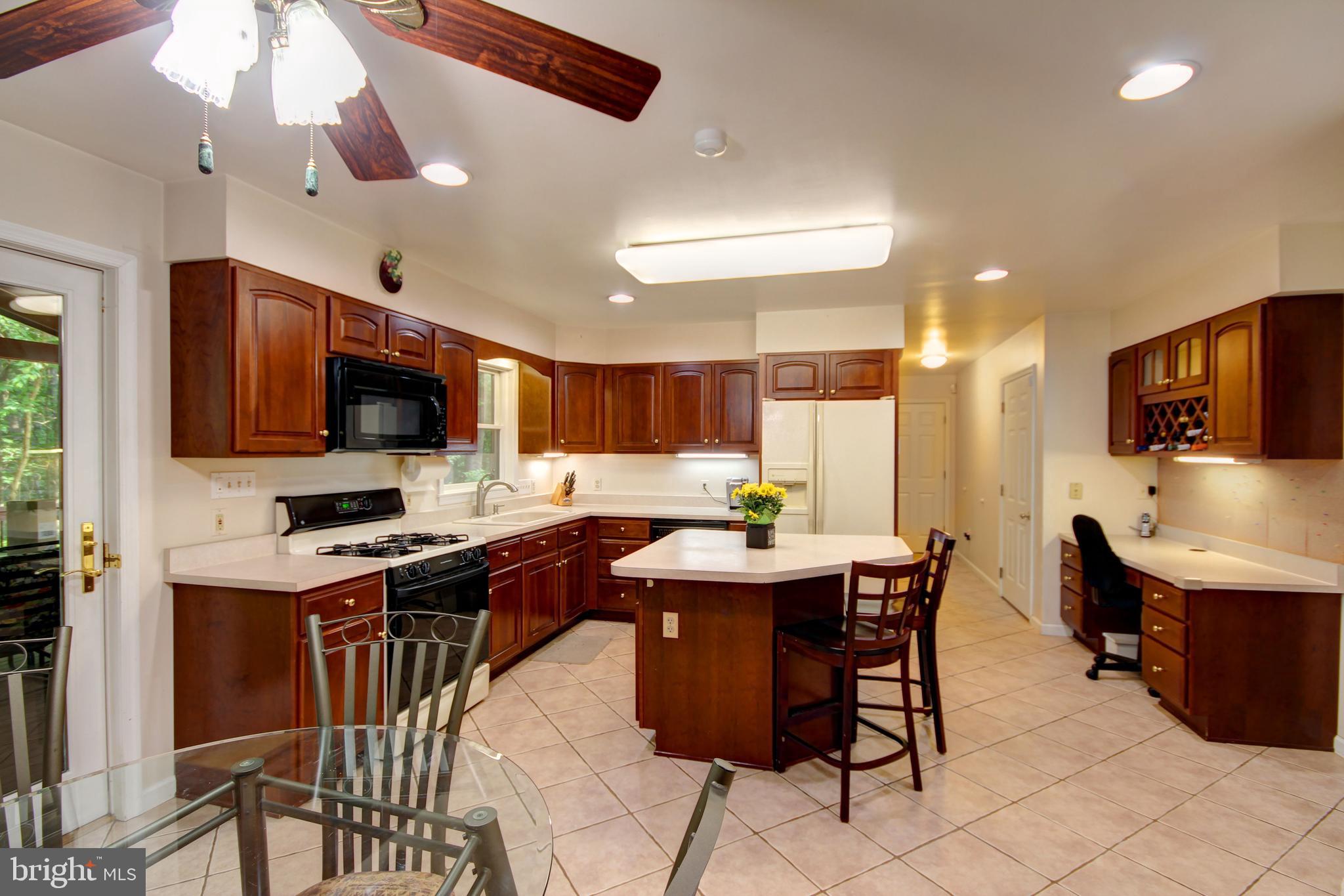 12412 Ivy Mill Road Reisterstown, MD 21136 - Photo 6 of 44 Island, homework desk and eat in area