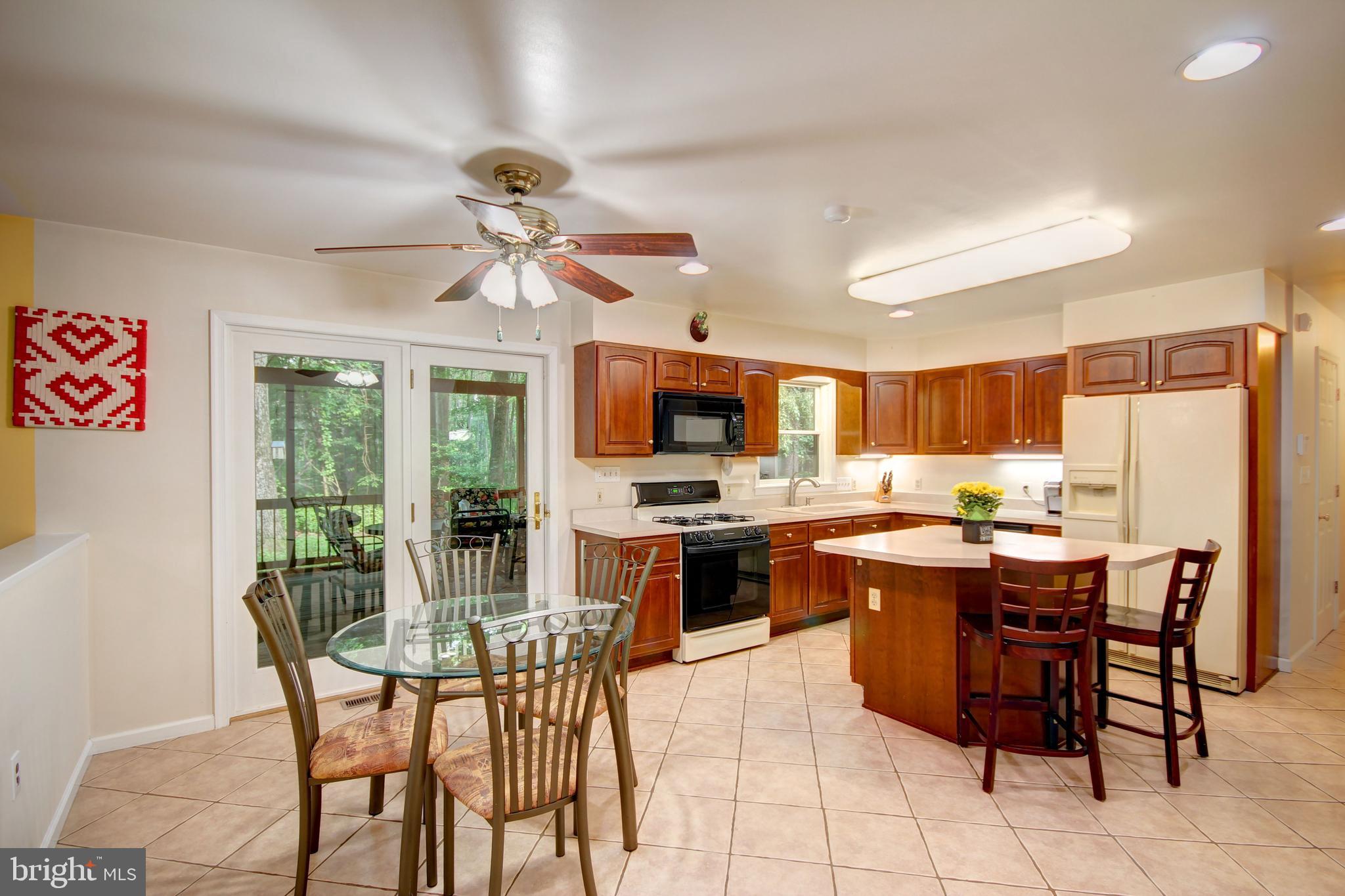12412 Ivy Mill Road Reisterstown, MD 21136 - Photo 7 of 44 Eat in kitchen with french doors to screened porch