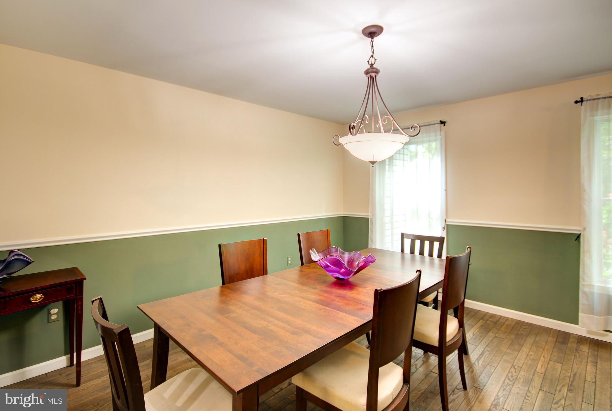 12412 Ivy Mill Road Reisterstown, MD 21136 - Photo 9 of 44 Big, bright formal dining room with hardwood