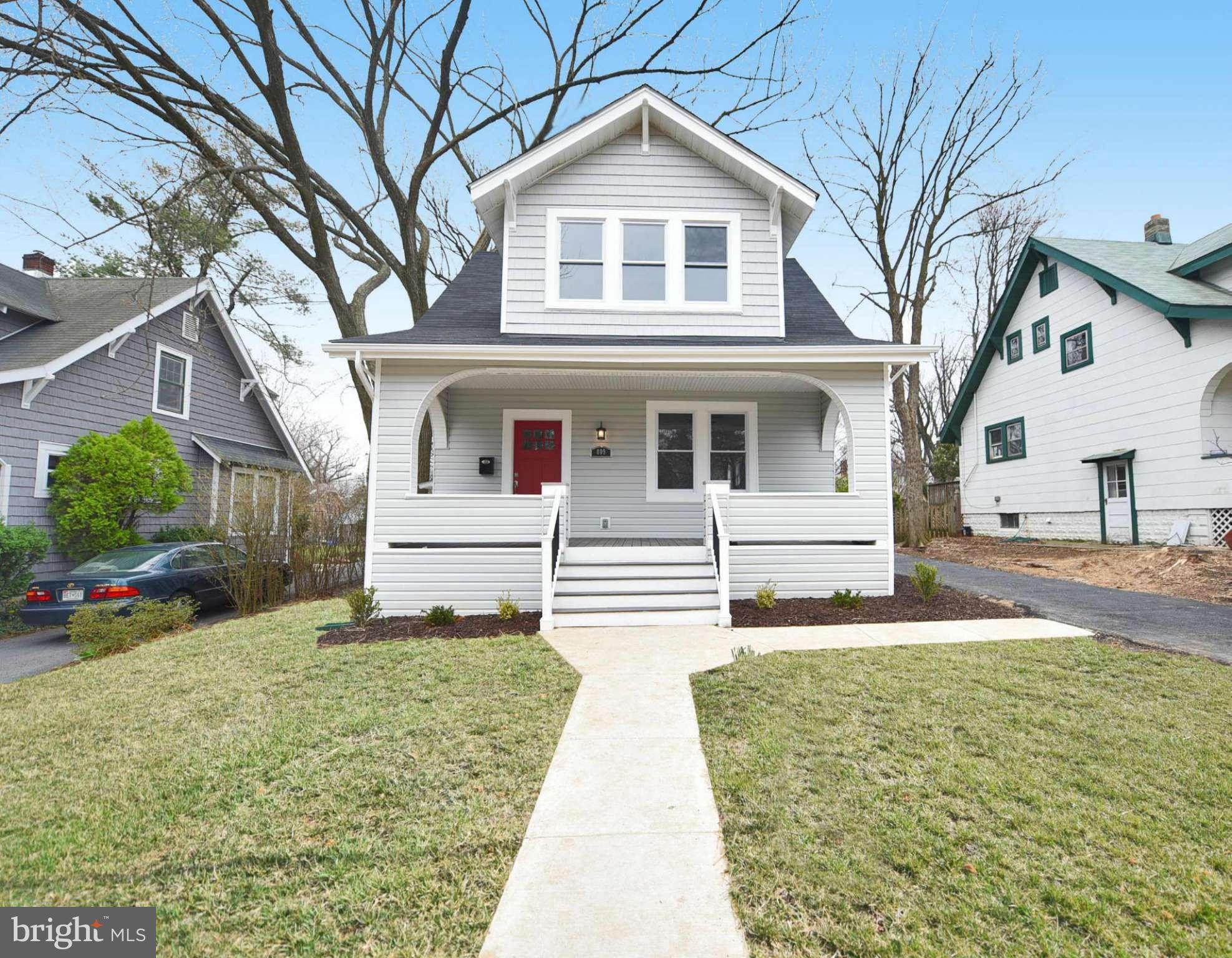 809 Cedarcroft Road Baltimore, MD 21212 - Photo 2 of 26 a front view of a house with a yard
