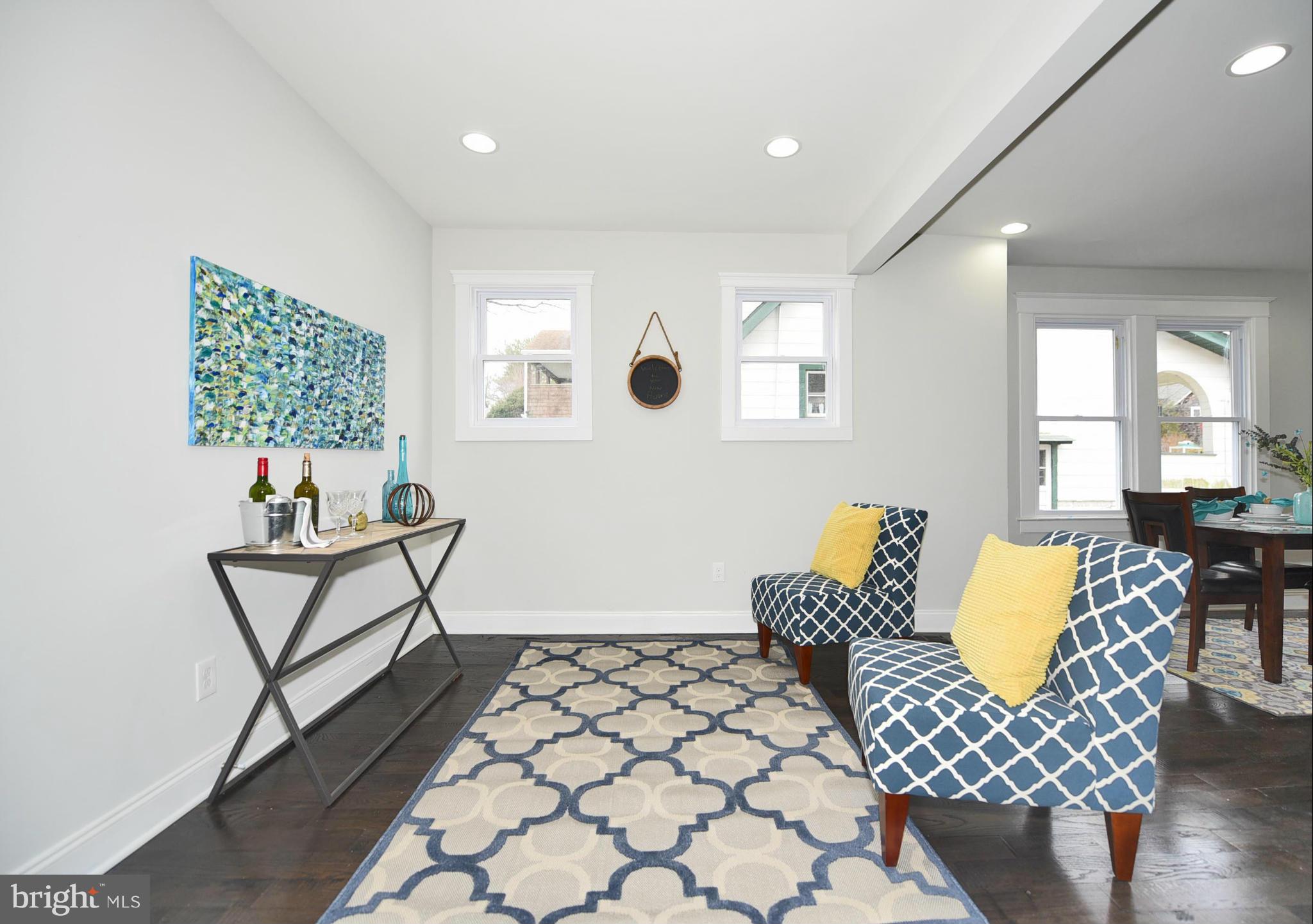 809 Cedarcroft Road Baltimore, MD 21212 - Photo 9 of 26 a living room with furniture and a large window