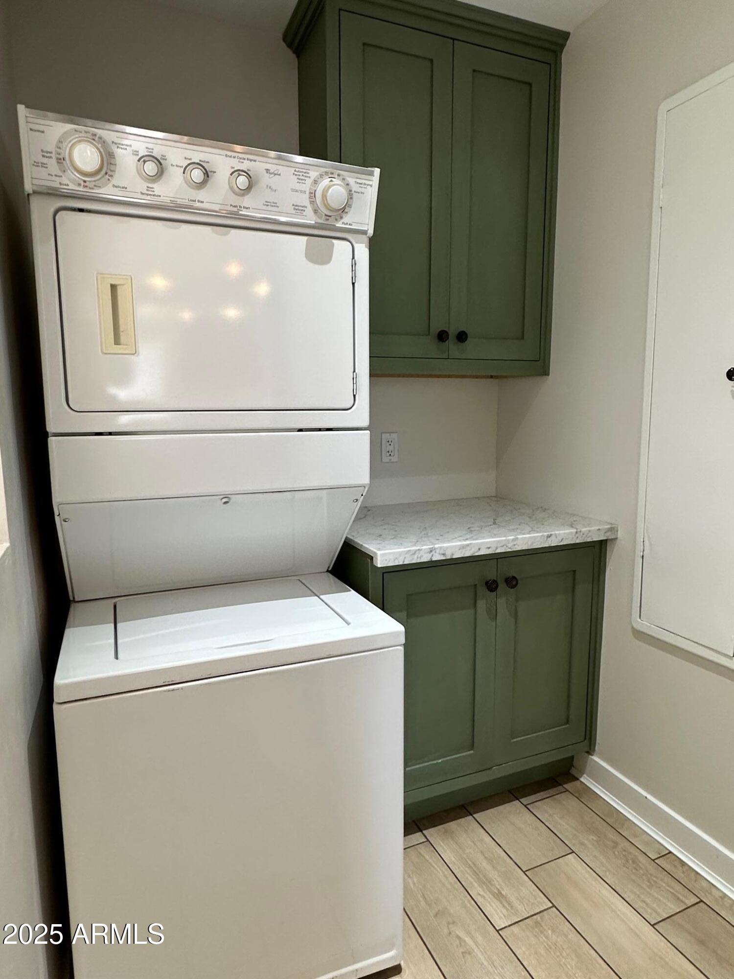 1315 West Holly Street Phoenix, AZ 85007 - Photo 11 of 24 a utility room with dryer and washer