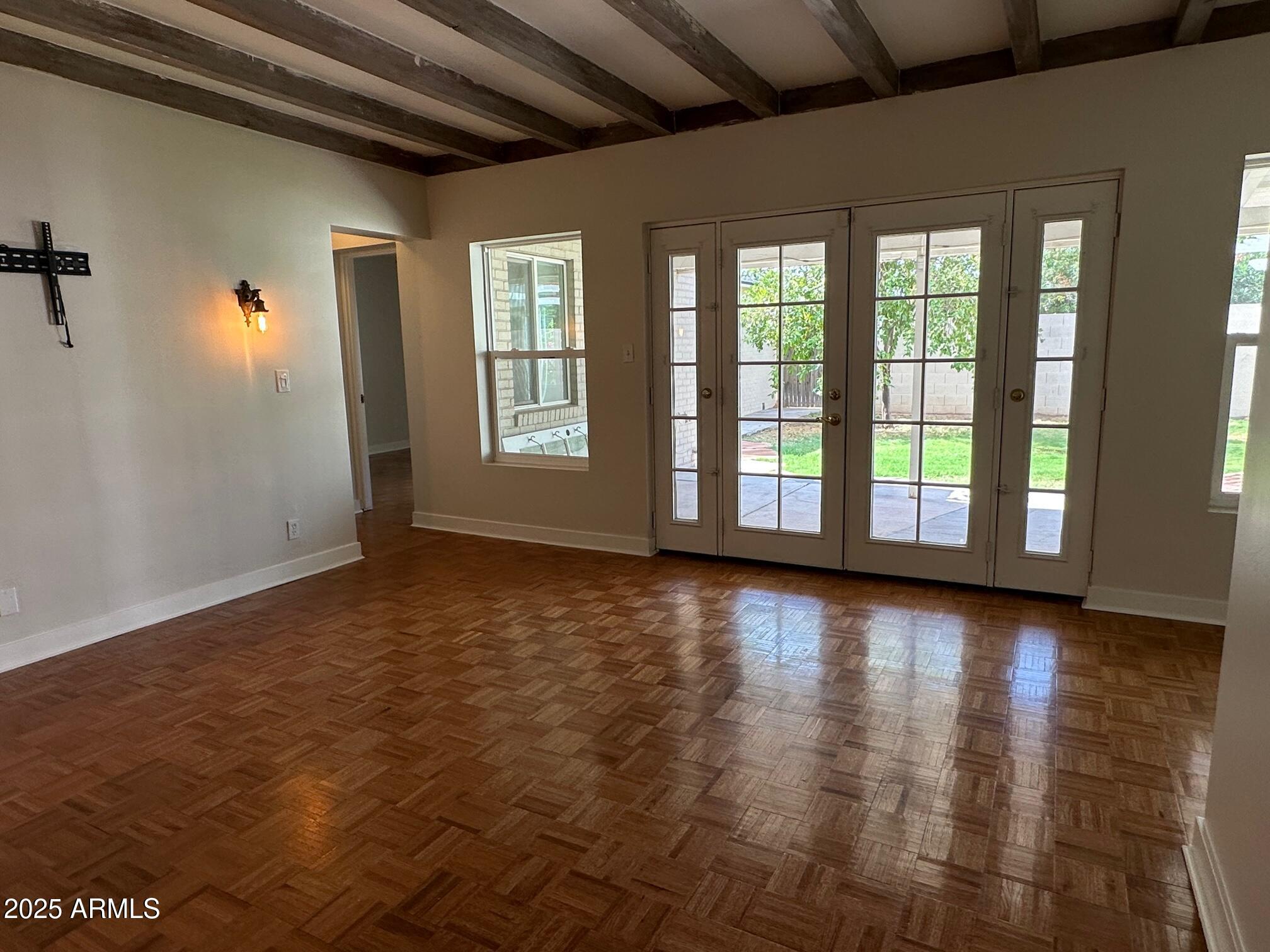 1315 West Holly Street Phoenix, AZ 85007 - Photo 12 of 24 a view of an empty room with a window