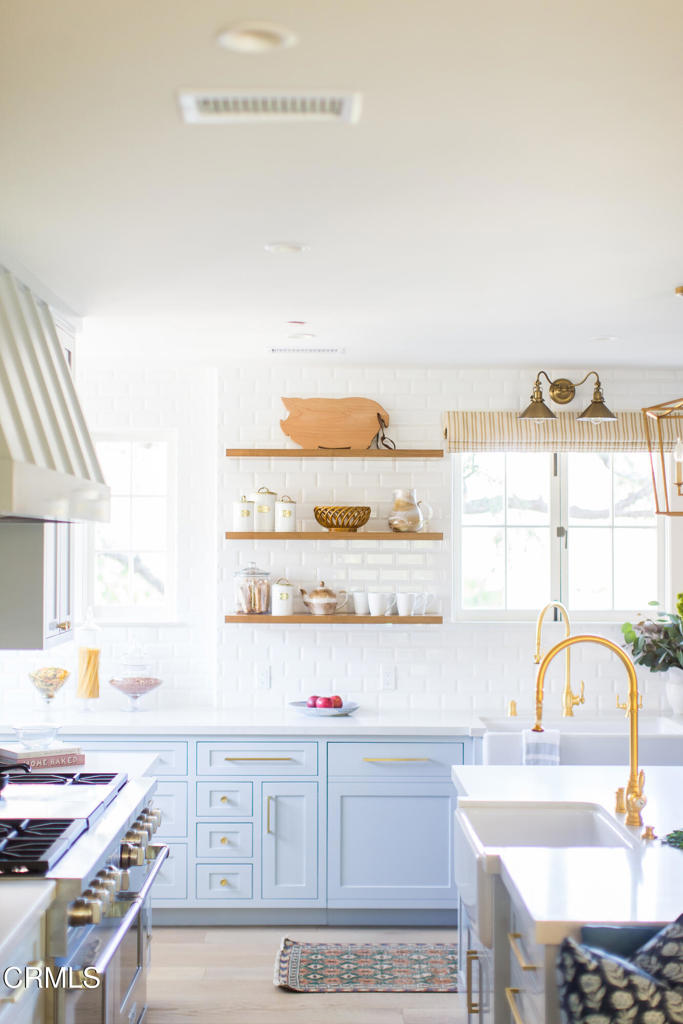 233 Hillside Road South Pasadena, CA 91030 - Photo 20 of 64 a kitchen with a sink cabinets and appliances