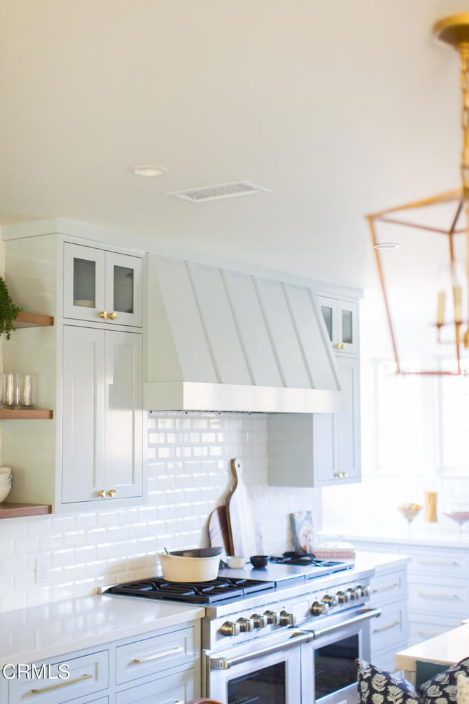 233 Hillside Road South Pasadena, CA 91030 - Photo 21 of 64 a stove top oven sitting inside of a kitchen