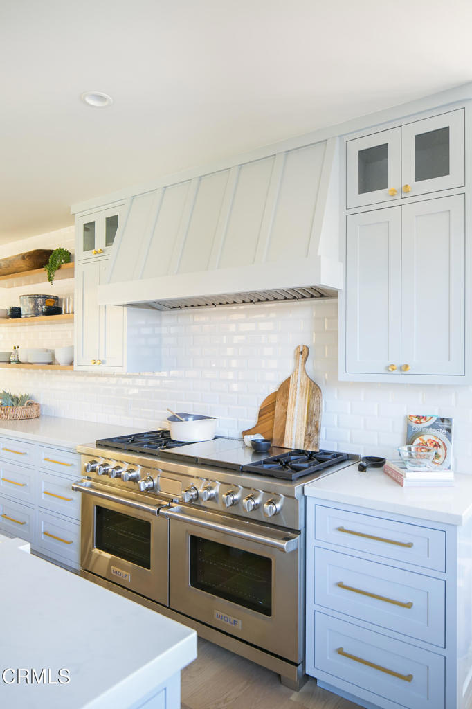 233 Hillside Road South Pasadena, CA 91030 - Photo 25 of 64 a stove top oven sitting inside of a kitchen