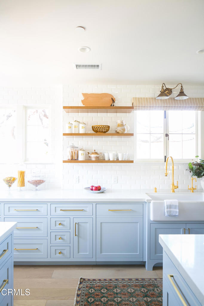 233 Hillside Road South Pasadena, CA 91030 - Photo 26 of 64 a kitchen with a sink a stove and cabinets