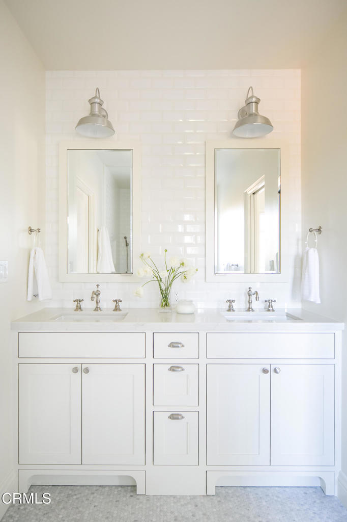 233 Hillside Road South Pasadena, CA 91030 - Photo 52 of 64 a bathroom with a sink vanity and a mirror