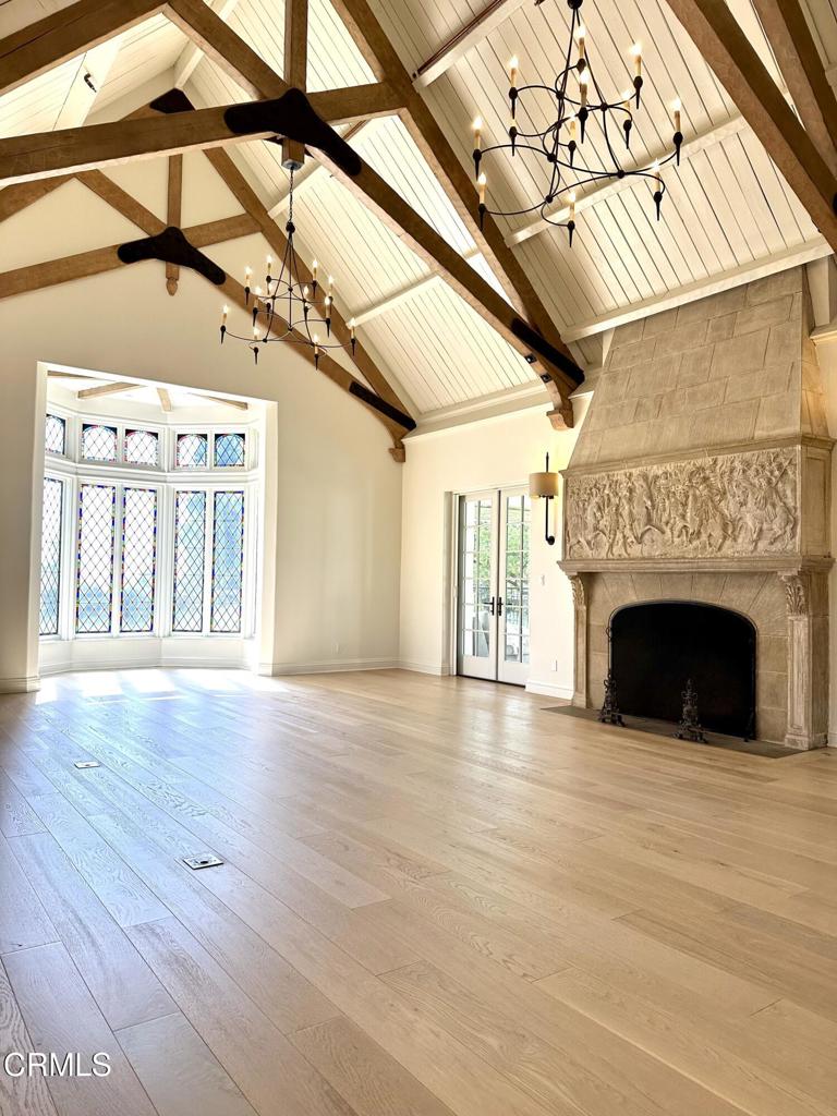 233 Hillside Road South Pasadena, CA 91030 - Photo 7 of 64 a view of a livingroom with wooden floor and a fireplace
