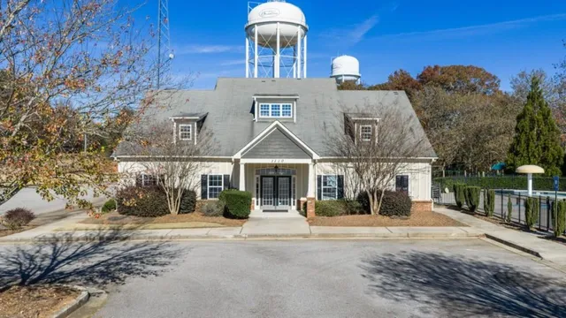 a aerial view of a house with swimming pool