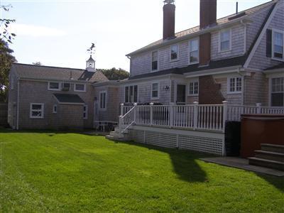 Undisclosed Address Harwich Port, MA 02646 - Photo 4 of 7 a view of a house with a yard