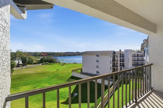 a view of a balcony with an outdoor space