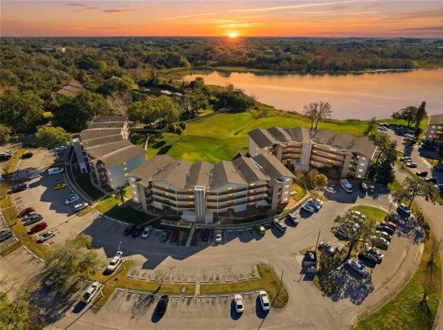 an aerial view of a house with a ocean view