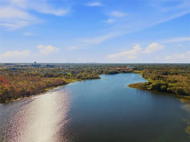 a view of a lake with houses in ocean