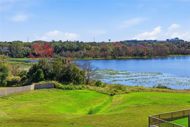 a view of a lake with a city