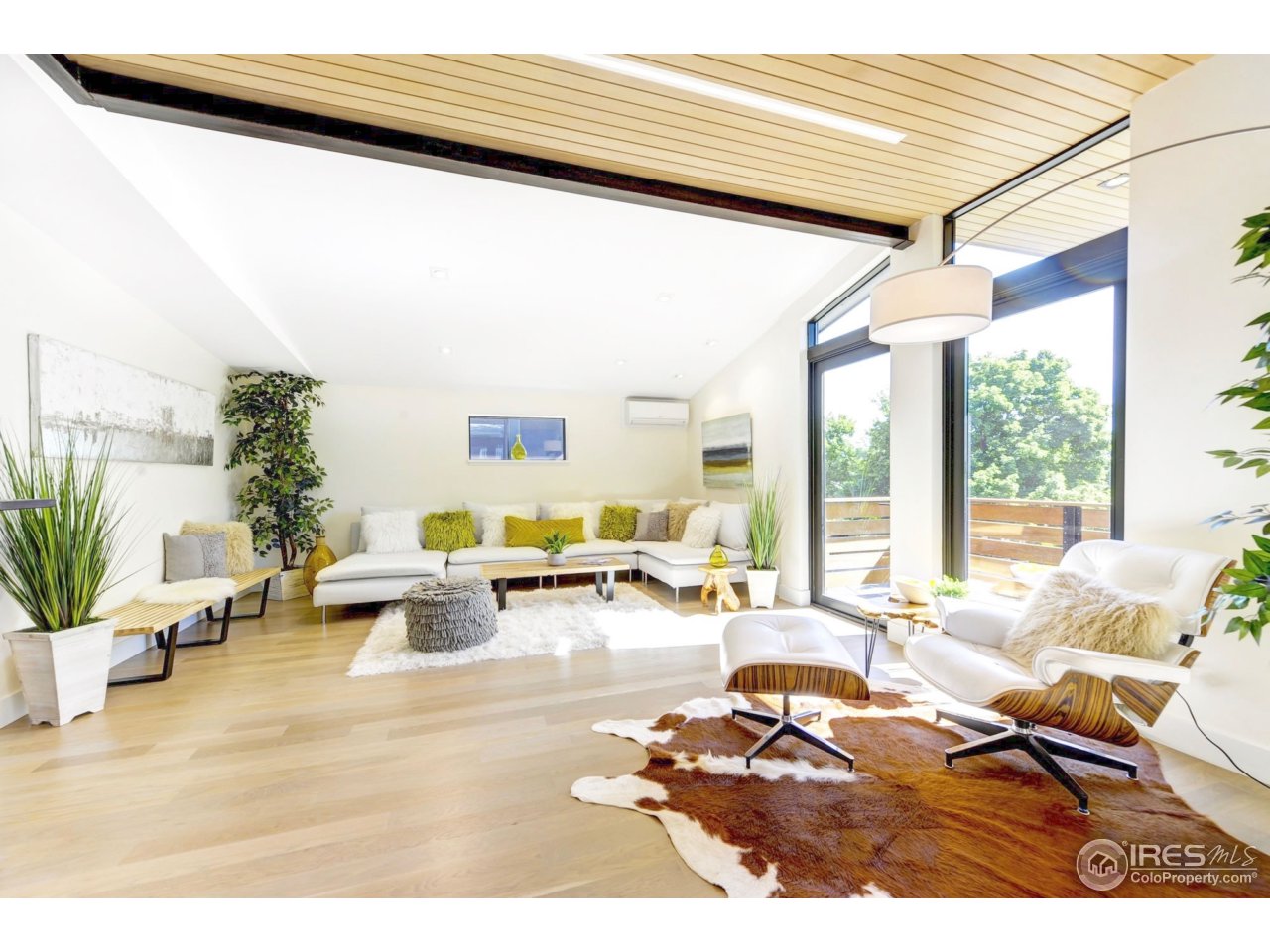 2725 6th Street Boulder, CO 80304 - Photo 3 of 40 a living room with furniture and wooden floor