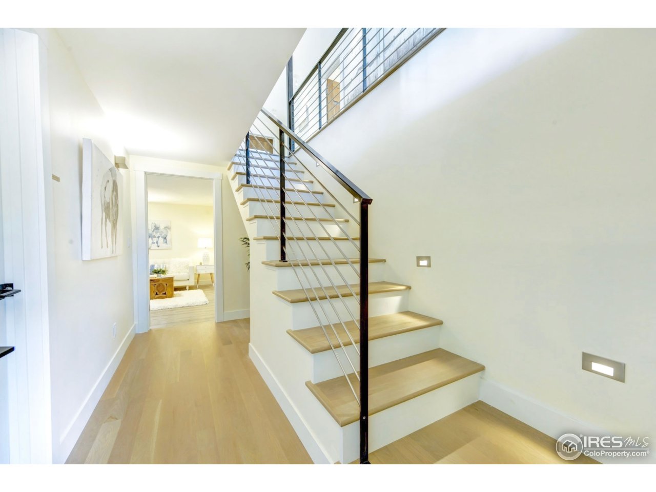 2725 6th Street Boulder, CO 80304 - Photo 31 of 40 a view of entryway and hall with wooden floor