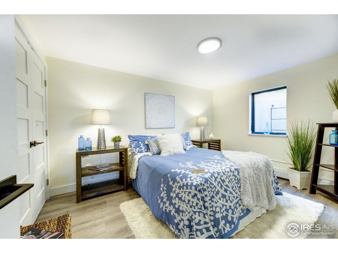 2725 6th Street Boulder, CO 80304 - Photo 35 of 40 a bedroom with a bed and a desk