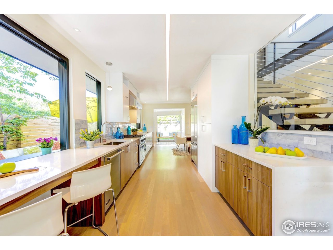 2725 6th Street Boulder, CO 80304 - Photo 6 of 40 a large kitchen with kitchen island a large window