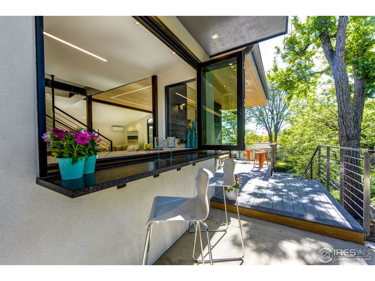 2725 6th Street Boulder, CO 80304 - Photo 8 of 40 a living room with furniture and flowers