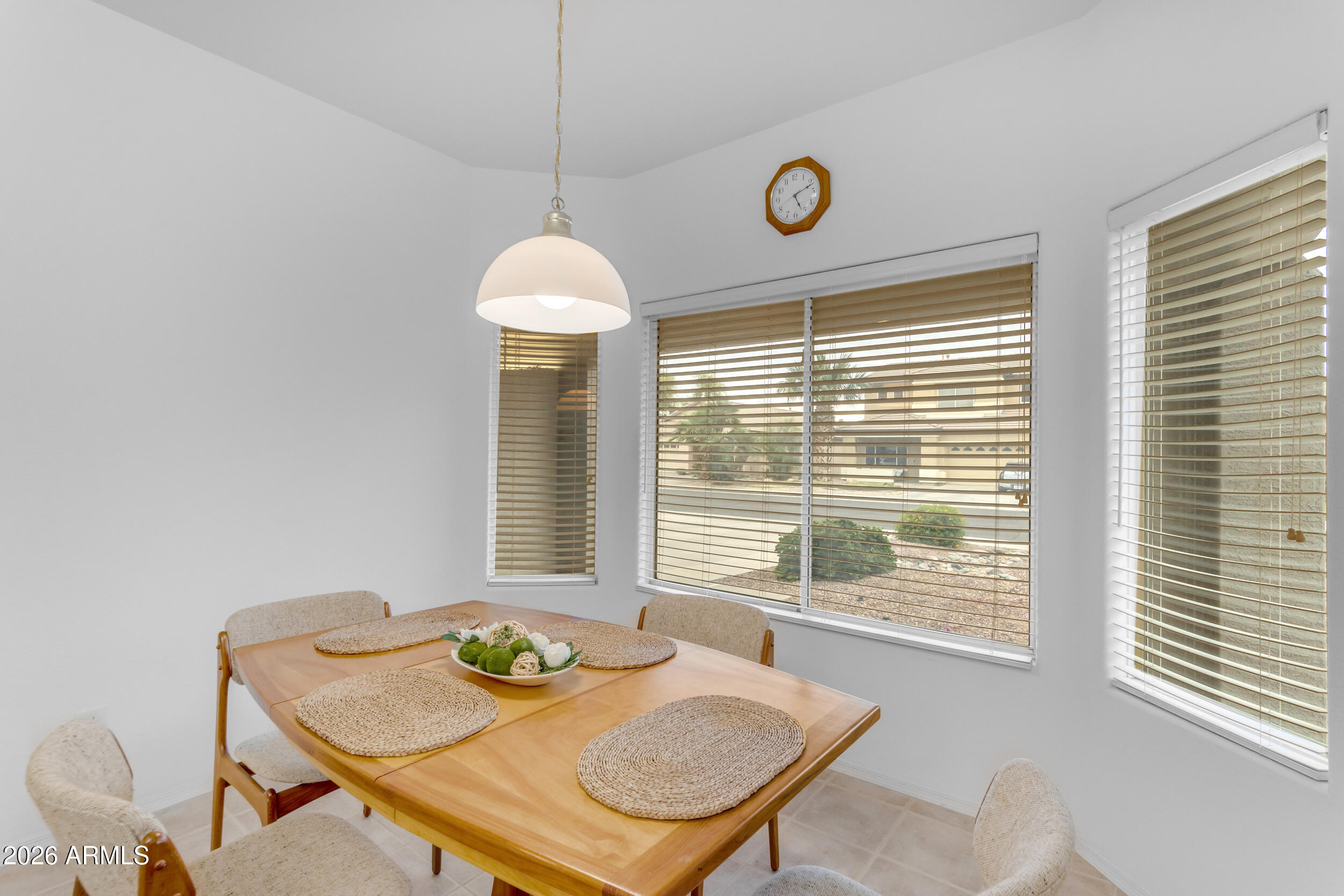 3724 East Derringer Way Gilbert, AZ 85297 - Photo 12 of 45 a view of a dining room with furniture window and outside view