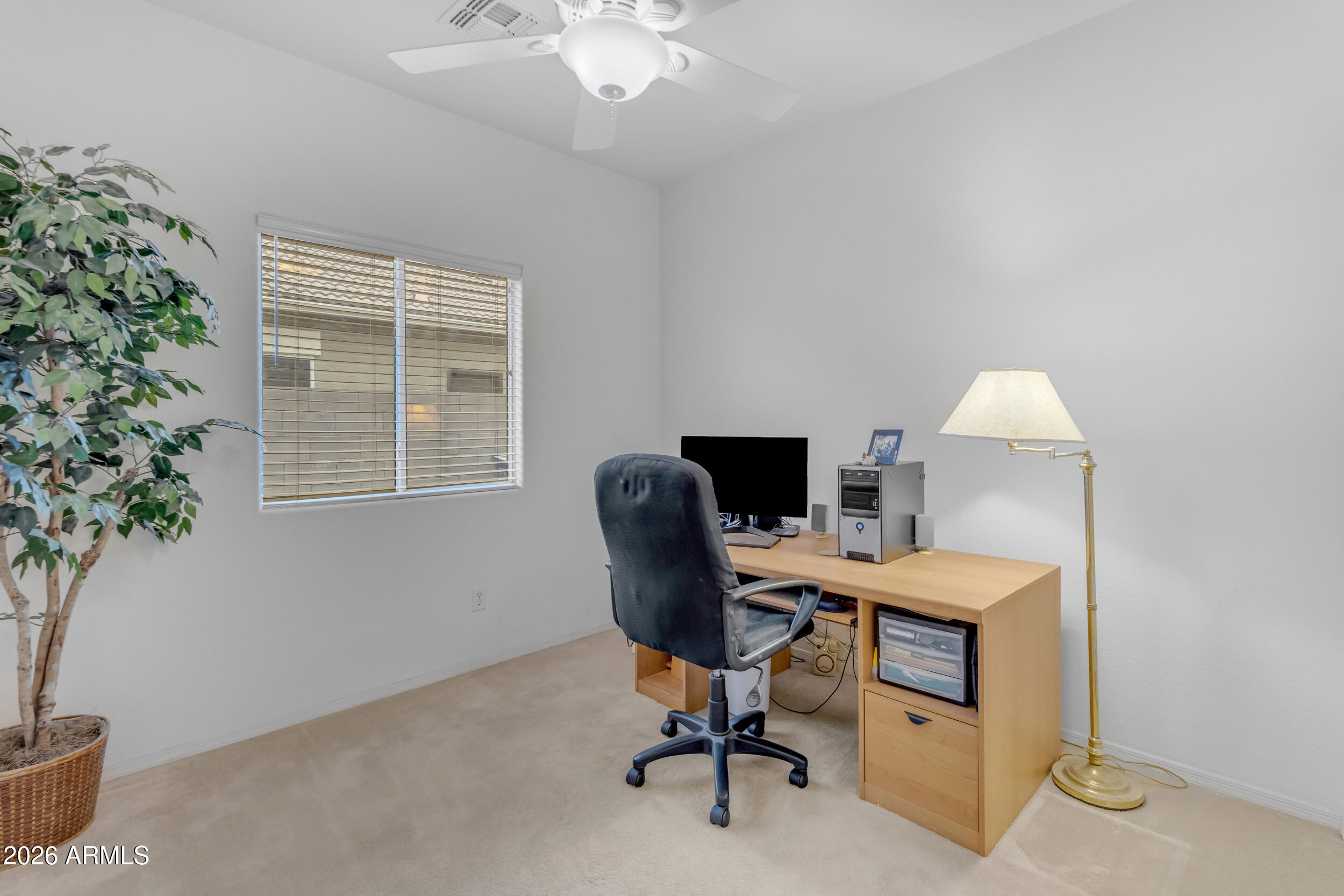 3724 East Derringer Way Gilbert, AZ 85297 - Photo 25 of 45 a view of a workspace with furniture and a window