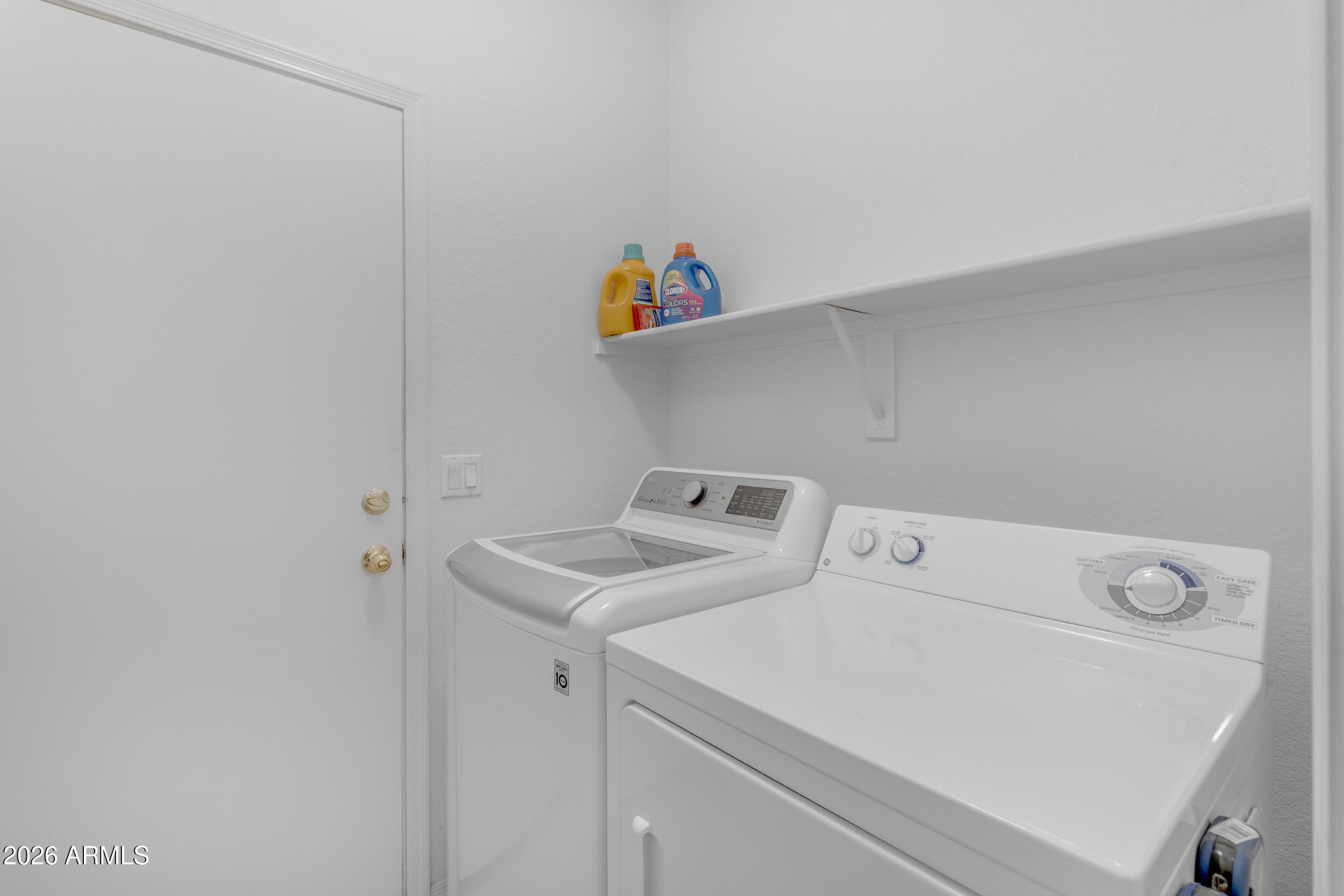 3724 East Derringer Way Gilbert, AZ 85297 - Photo 29 of 45 a utility room with dryer and washer