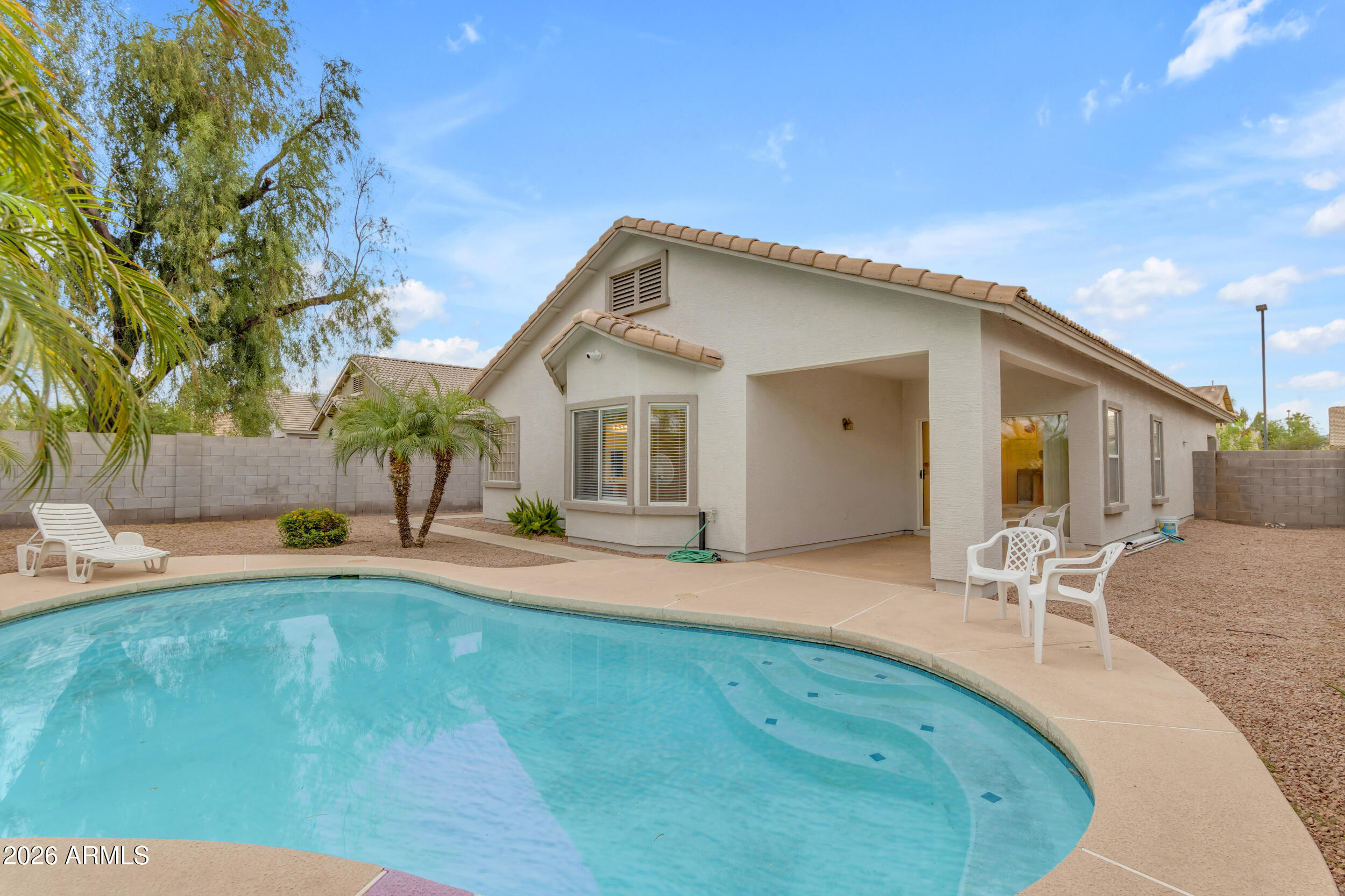 3724 East Derringer Way Gilbert, AZ 85297 - Photo 37 of 45 a view of a house with backyard porch and sitting area