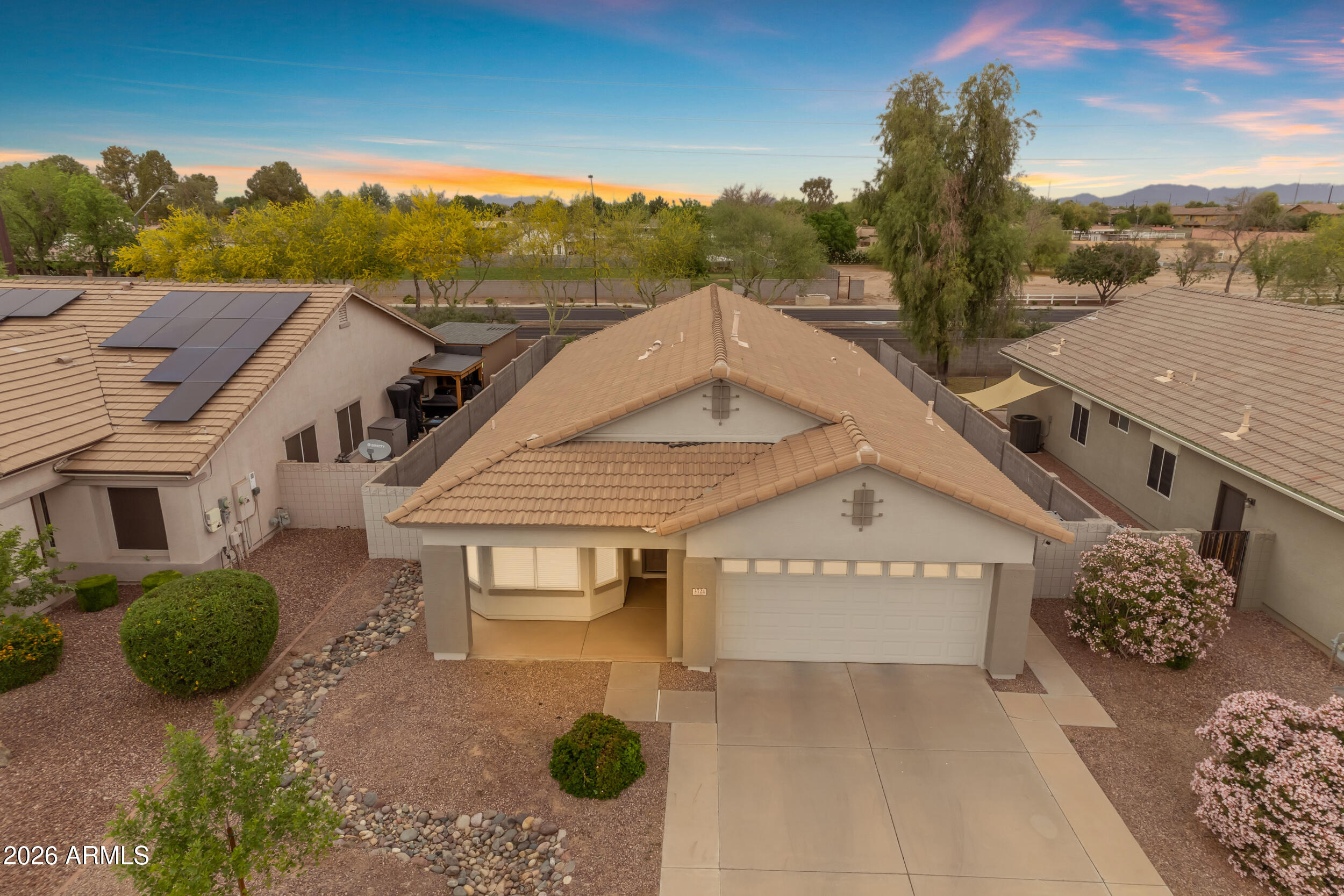 3724 East Derringer Way Gilbert, AZ 85297 - Photo 40 of 45 a view of a house with a yard