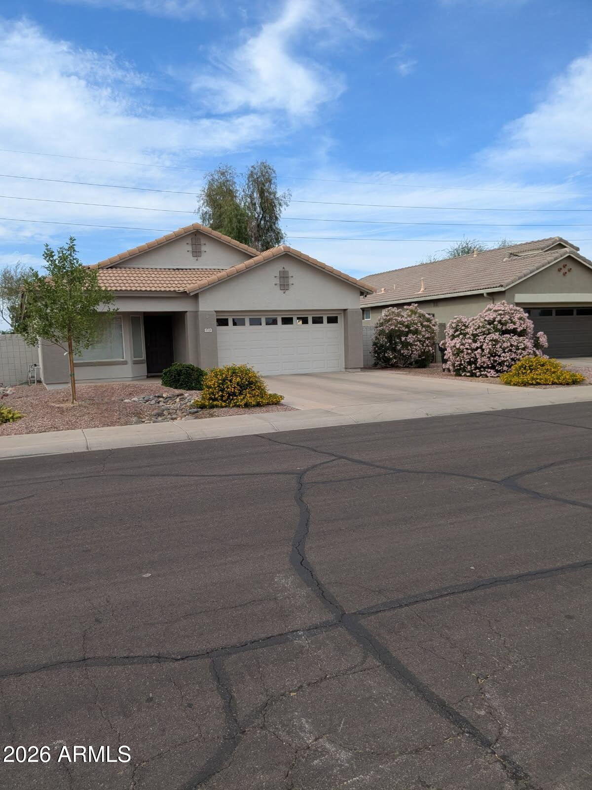 3724 East Derringer Way Gilbert, AZ 85297 - Photo 42 of 45 a view of a house with a yard