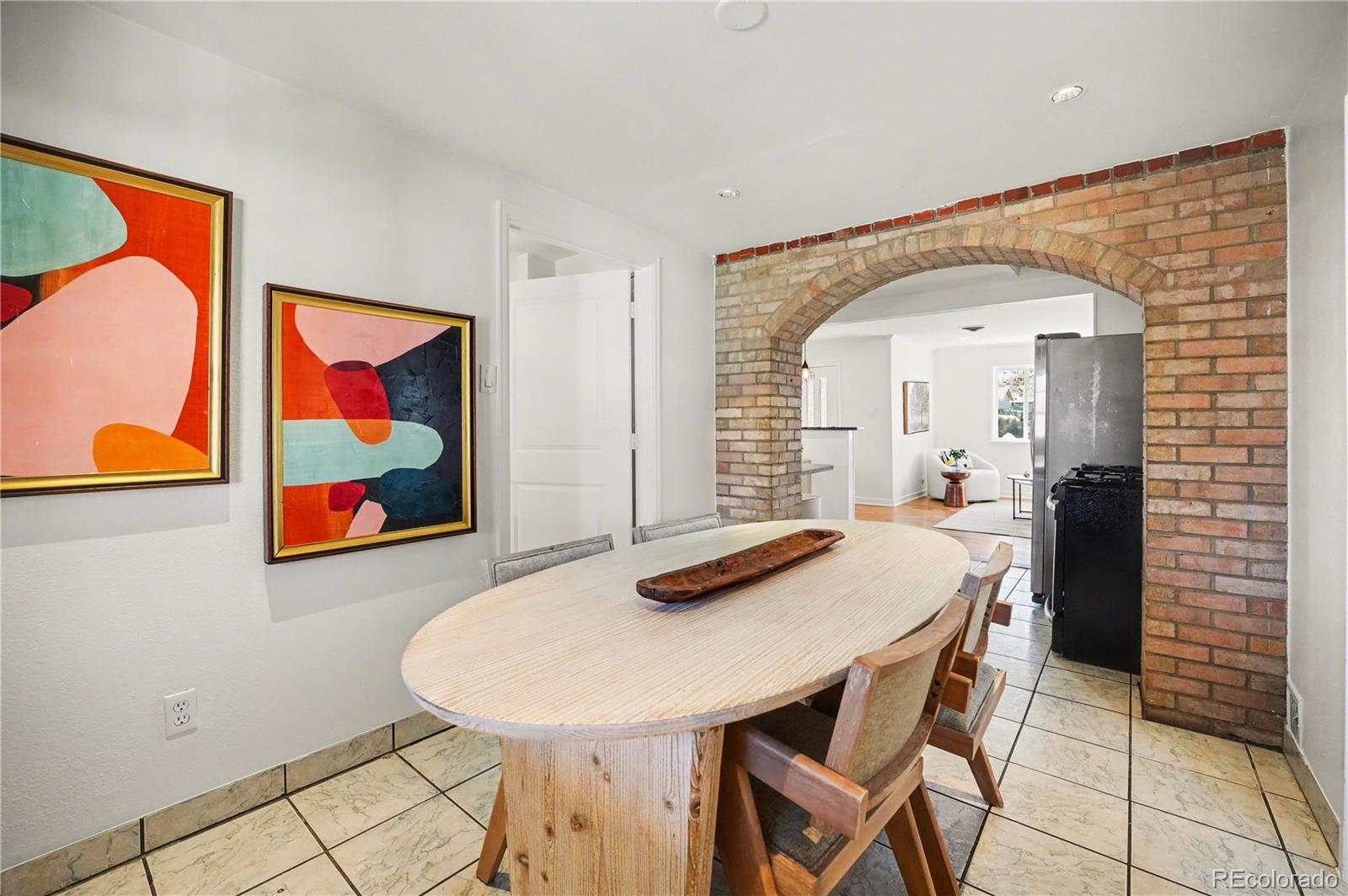 4870 Raritan Street Denver, CO 80221 - Photo 11 of 21 a view of a dining room with furniture