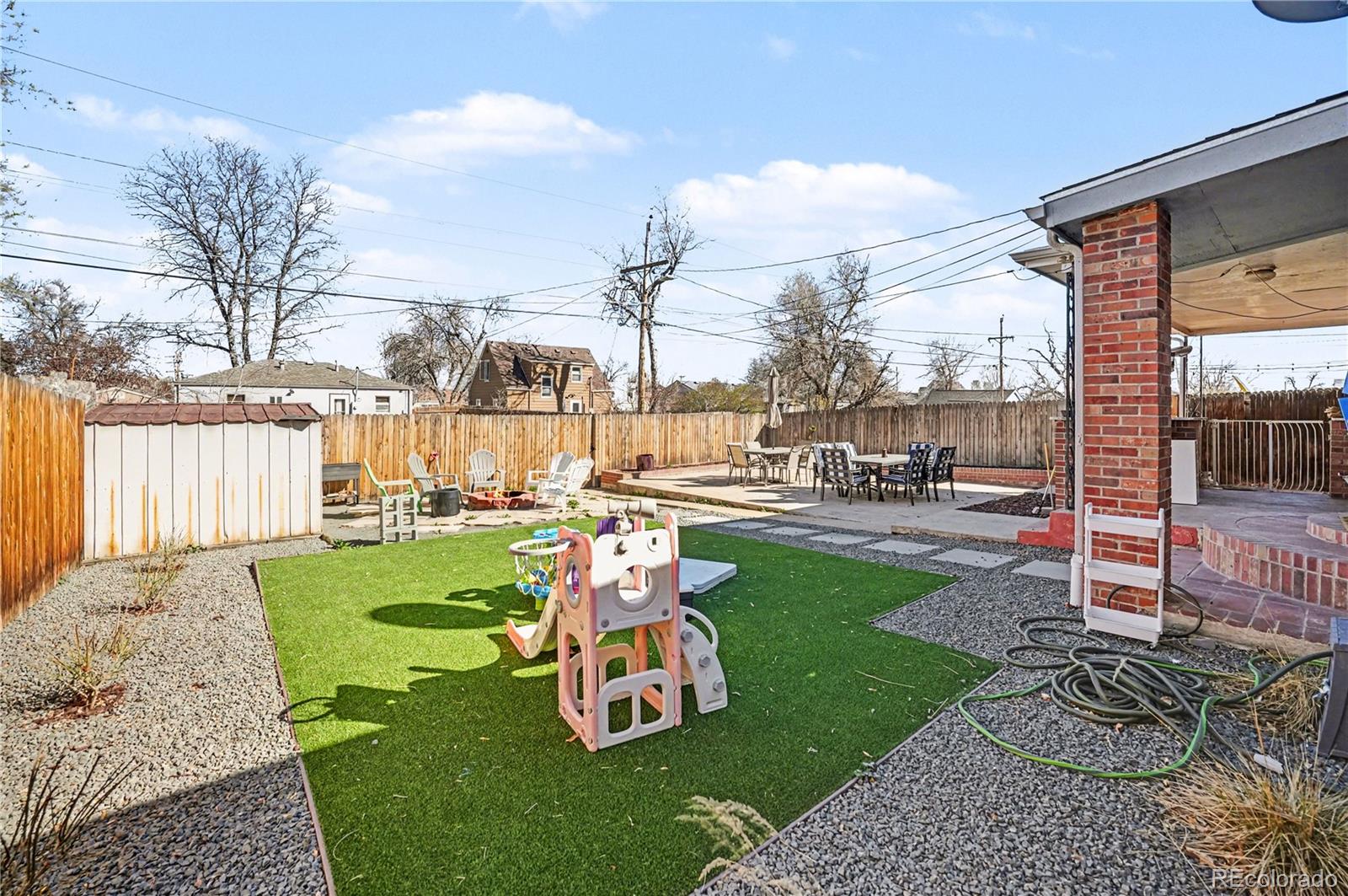 4870 Raritan Street Denver, CO 80221 - Photo 20 of 21 a garden view with a seating space
