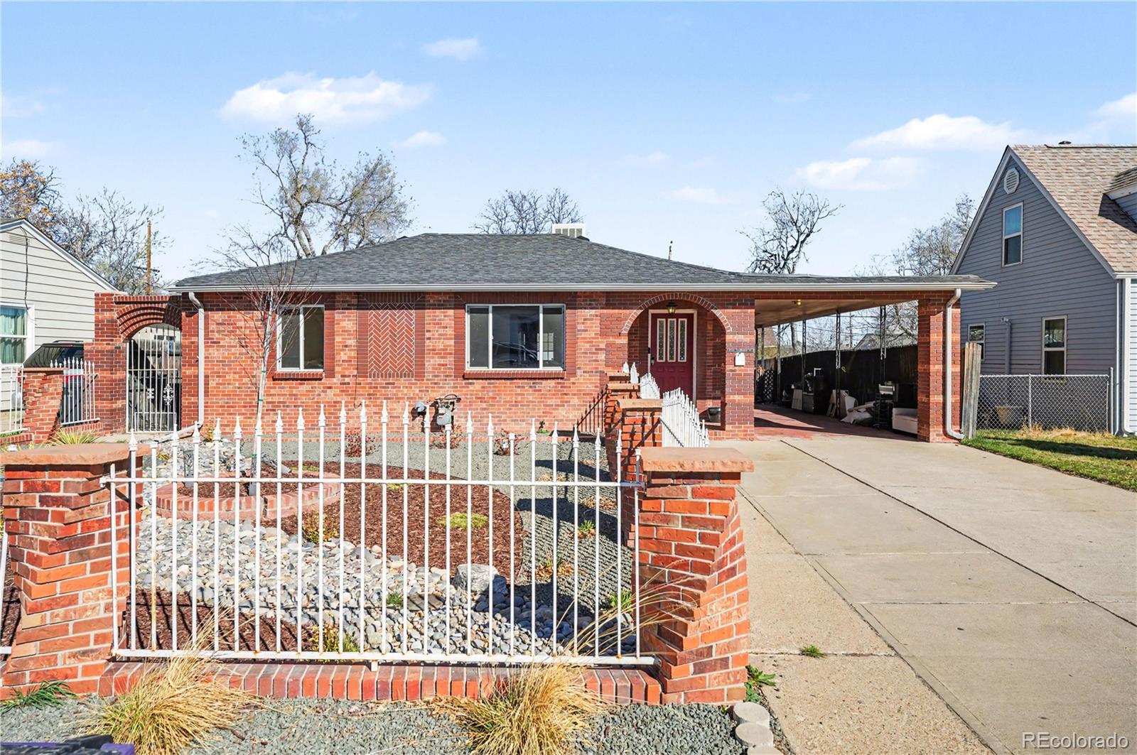 4870 Raritan Street Denver, CO 80221 - Photo 2 of 21 front view of a house