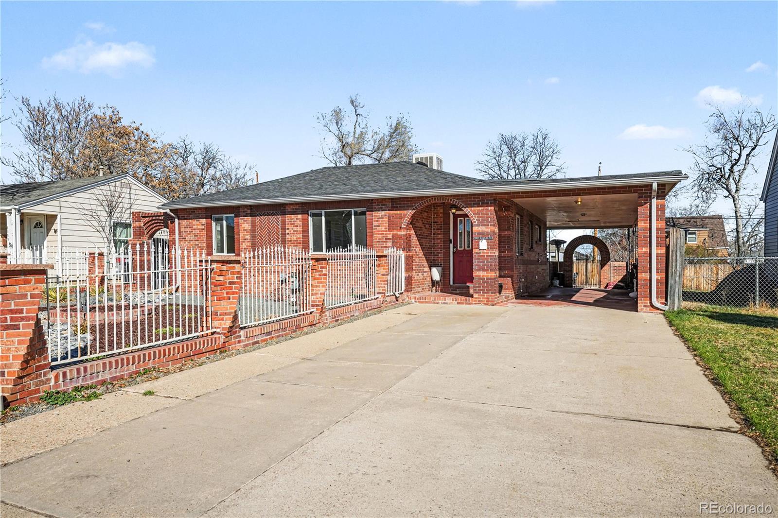 4870 Raritan Street Denver, CO 80221 - Photo 4 of 21 a view of a house with backyard and porch