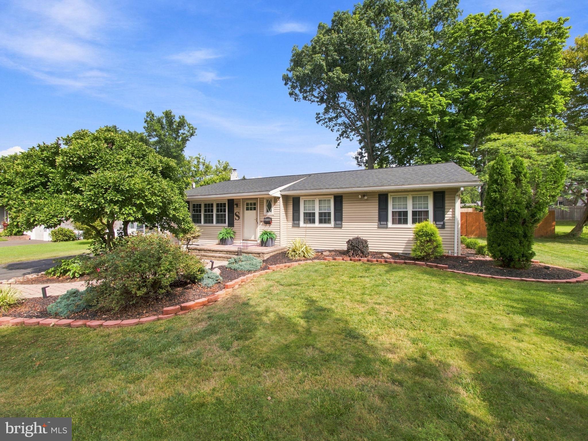 906 Big Oak Road Yardley, PA 19067 - Photo 2 of 39 Charming home with lush landscaping.