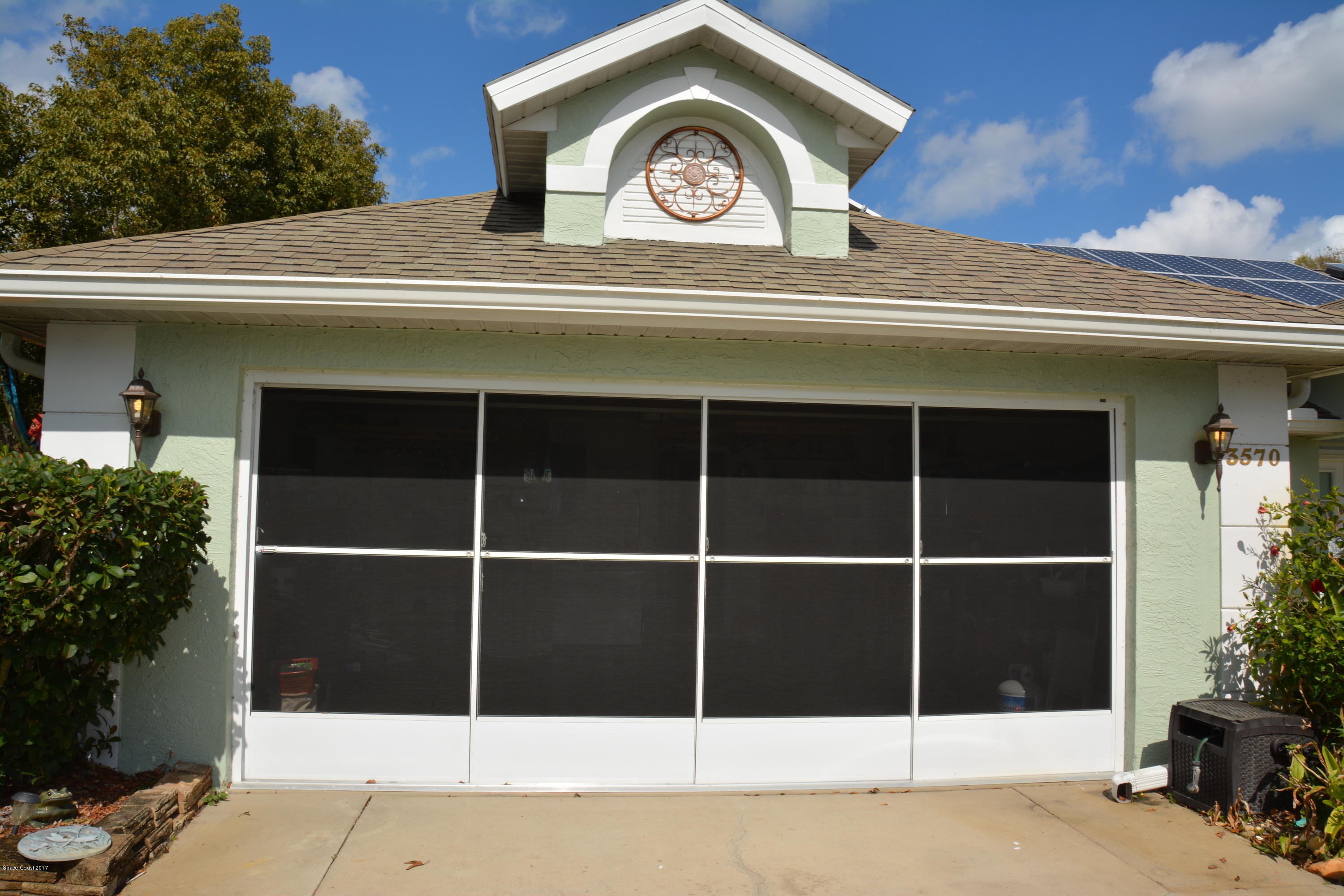 3570 Holly Springs Road Melbourne, FL 32934 - Photo 6 of 8 Screened Garage