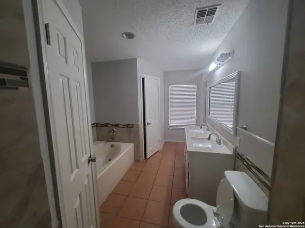 a close view of a bathtub in bathroom