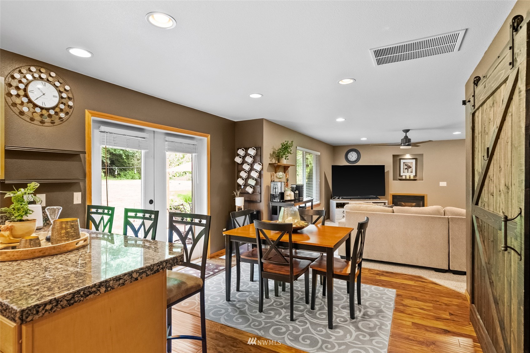 6741 Northwest Ranger Way Silverdale, WA 98383 - Photo 15 of 38 a view of a dining room with furniture window and outside view