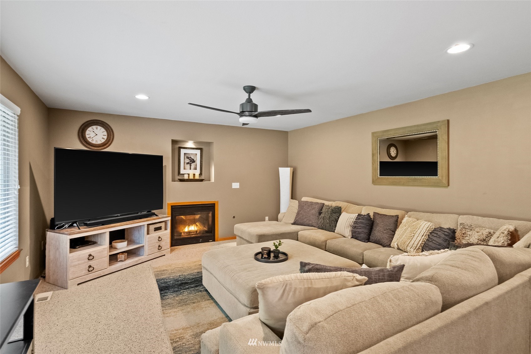 6741 Northwest Ranger Way Silverdale, WA 98383 - Photo 16 of 38 a living room with furniture and a flat screen tv